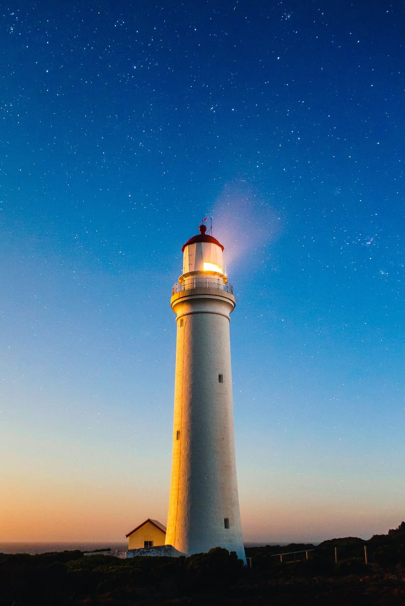 Why a Lighthouse? The Story Behind Our Logo