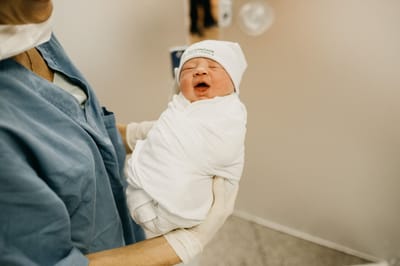PASTOR AND WIFE WELCOME NEW GRANDSON