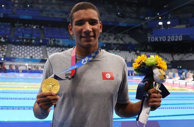 الشكوك تحوم حول مشاركة السباح التونسي 
أحمد الحفناوي بالألعاب الأولمبية.