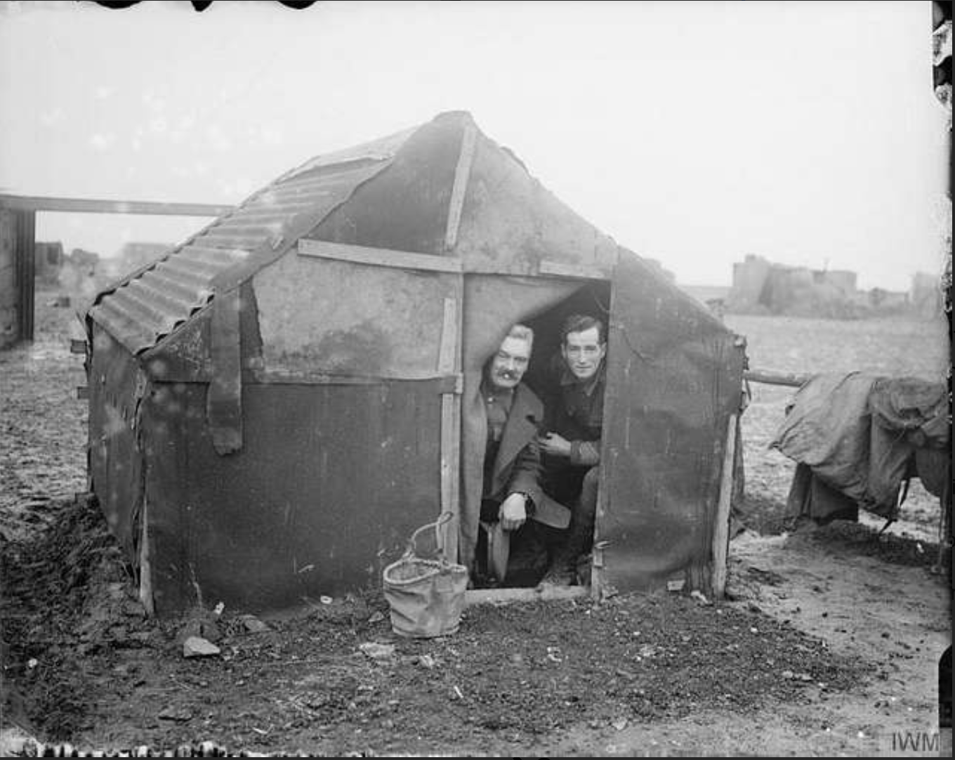 LUTTMAN, Henry Christian. 1278. Serjeant Major 2KEH. Transferred as a Warrant Officer Class 2, 15th Battalion, Tank Corps 111989. Named in a photograph taken at Meaulte, December 1916 and is the left hand side figure.