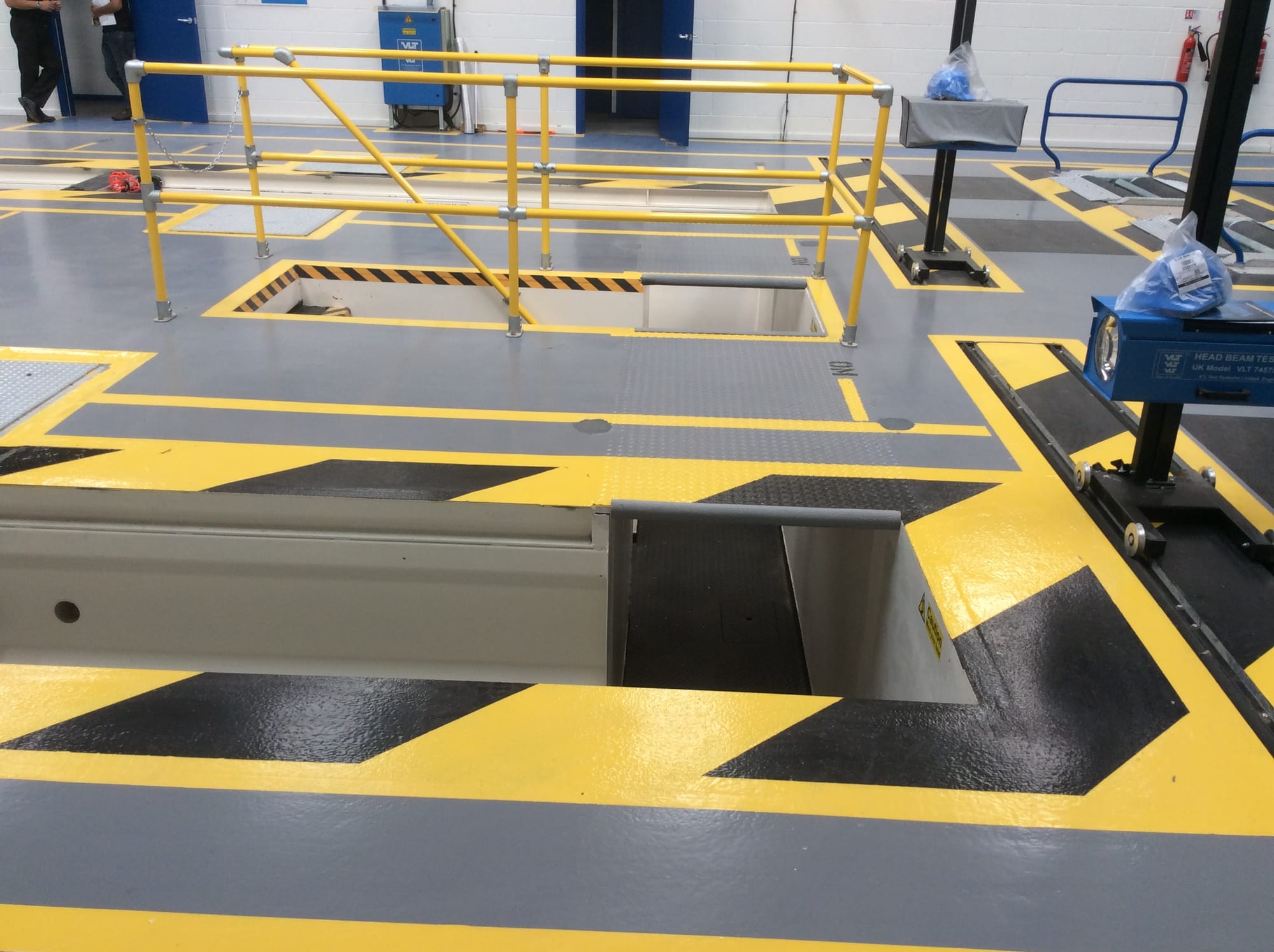 View across both pits, access steps between the two.