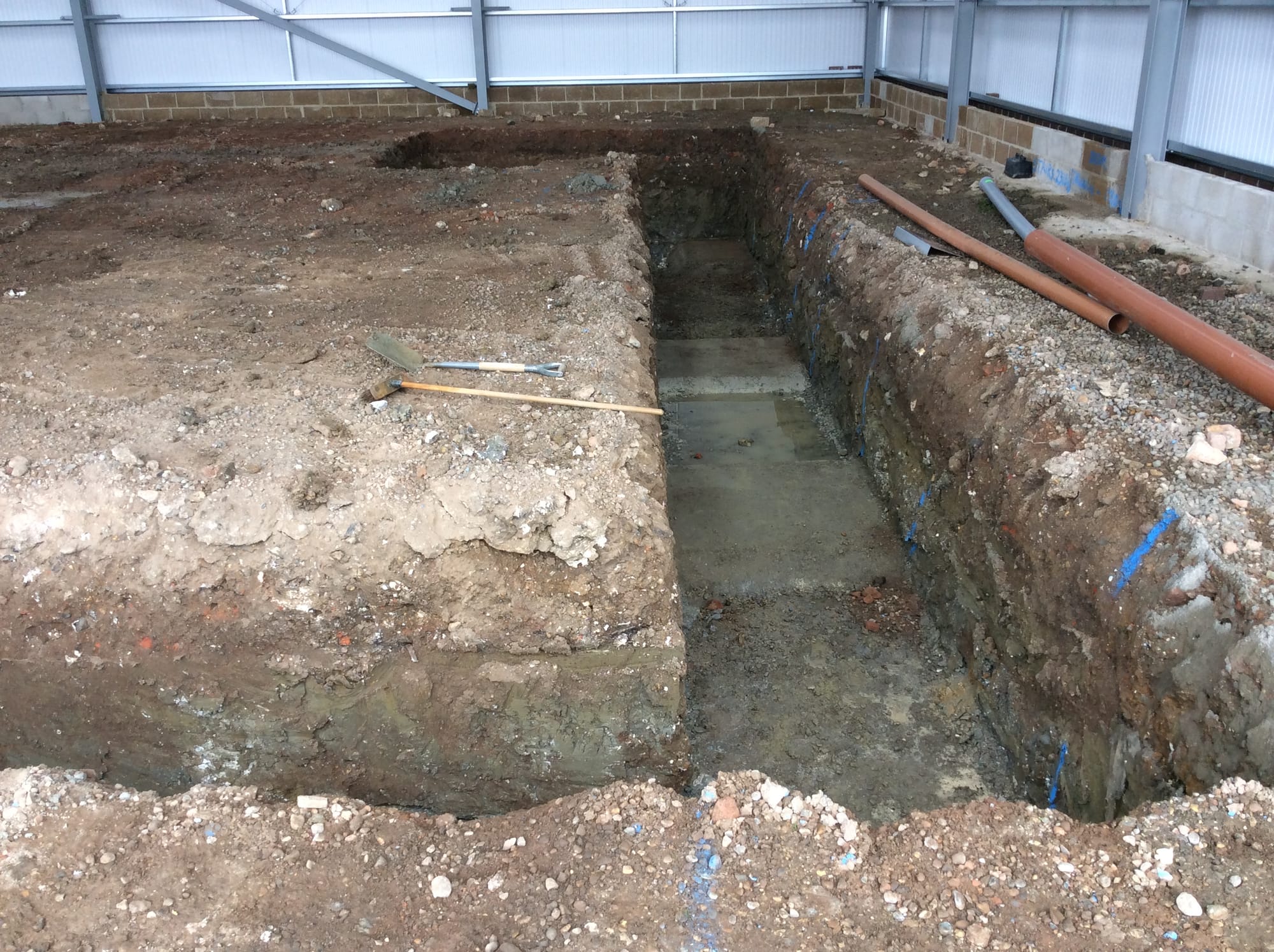 Building works already completed to accept inspection pit.