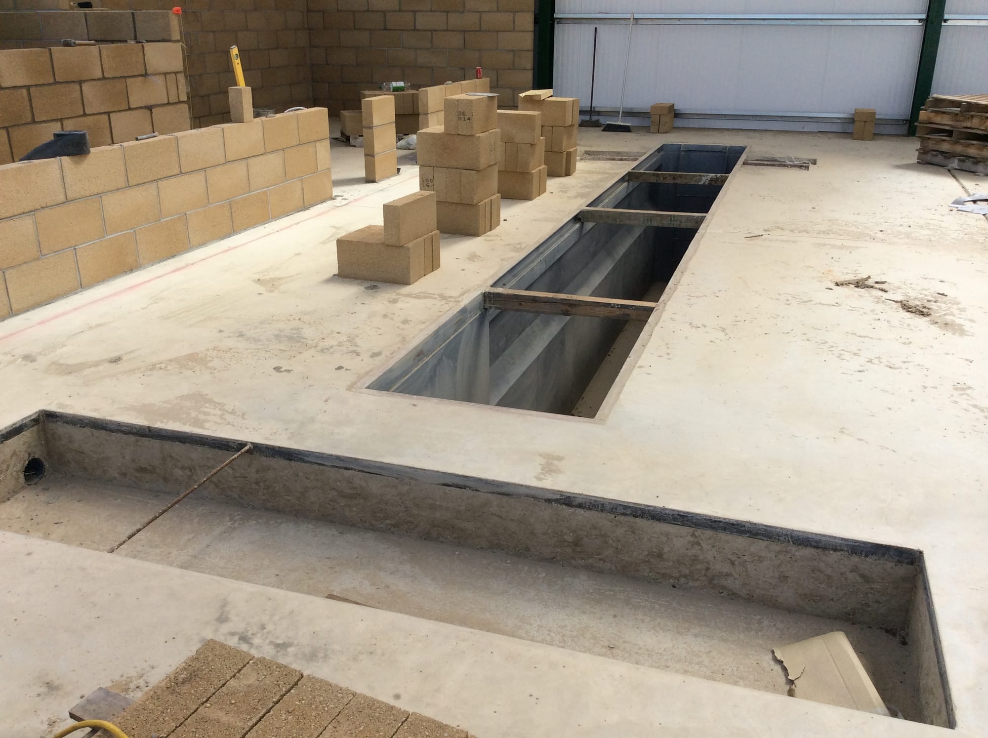 Inspection Pit fully concreted in along with roller brake tester frame.