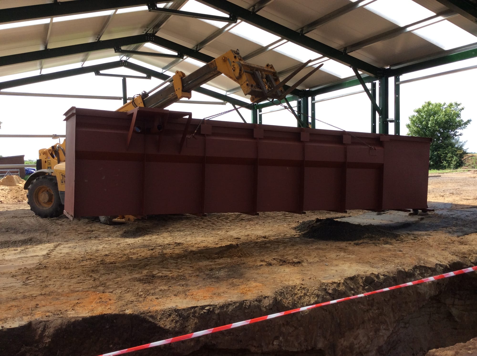 Inspection Pit being lowered into position.