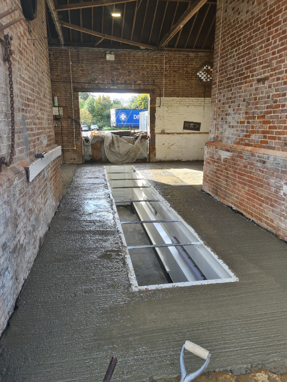 Two more concrete pours brought the concrete to finished floor level.