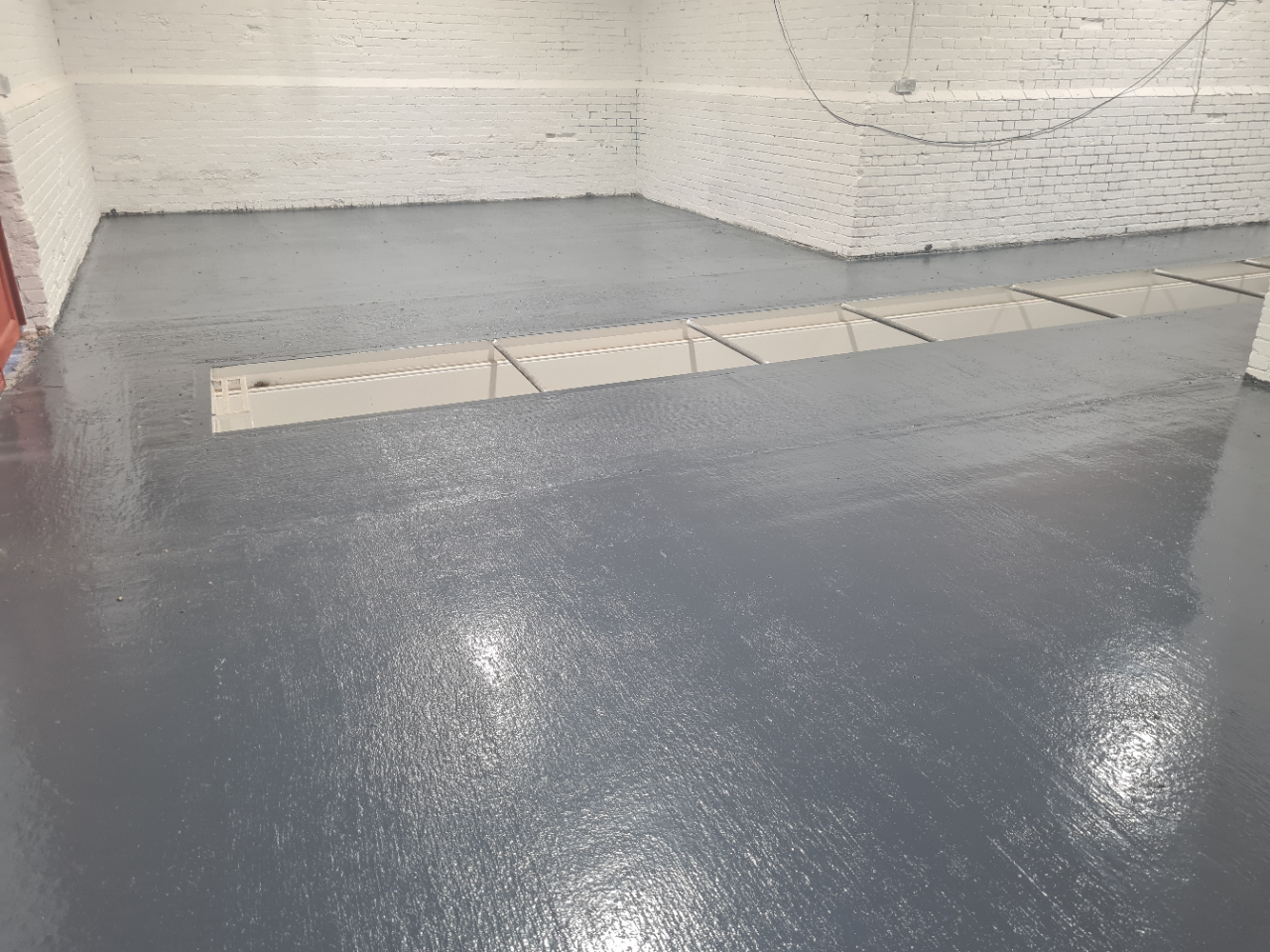 A fine looking workshop utilising the existing building on the premises.