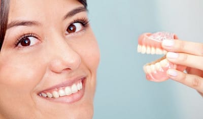 Smile Confidently Again With Dentures: Restoring Your Natural Look And Function