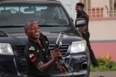 Trending photos of one of the police officers that fired teargas at Saraki, others in Abuja today