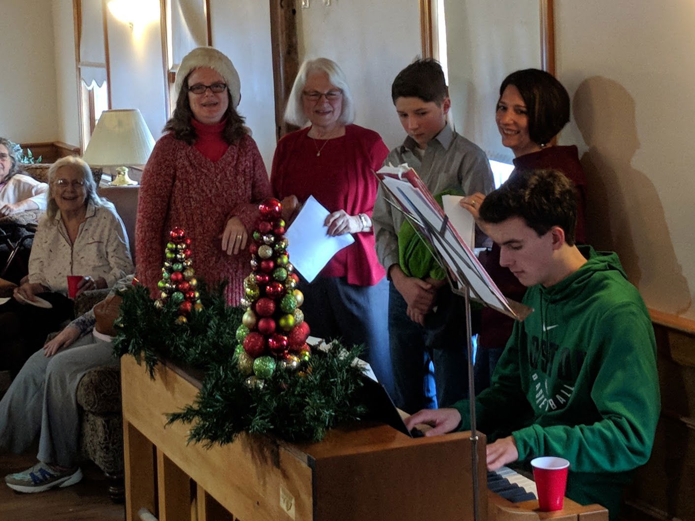 Caroling at Pine Rock Manor