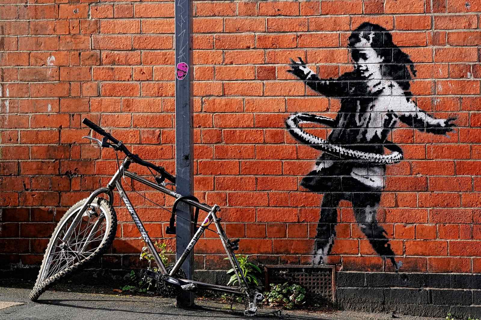 Young girl hula-hooping stenciled