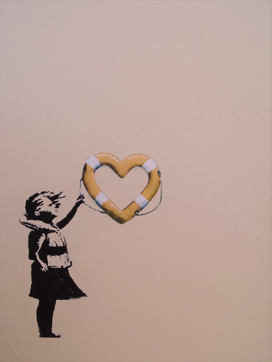 Girl with heart shaped float