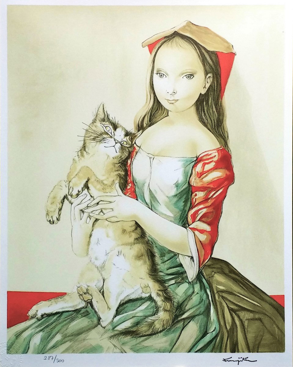 Girl in a hood holding a cat