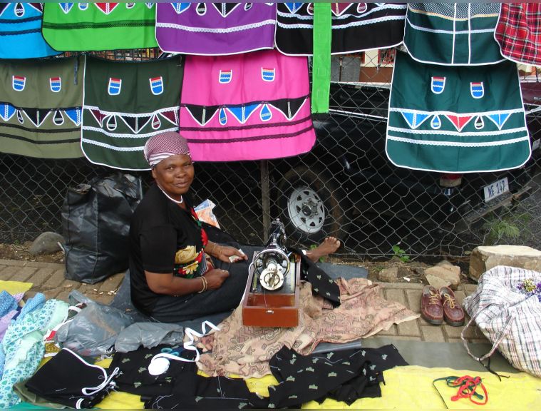 Please support informal local business. This business woman is a tailor specialising in making this traditional attire,,,beautiful