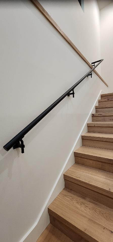 Matte black handrail.