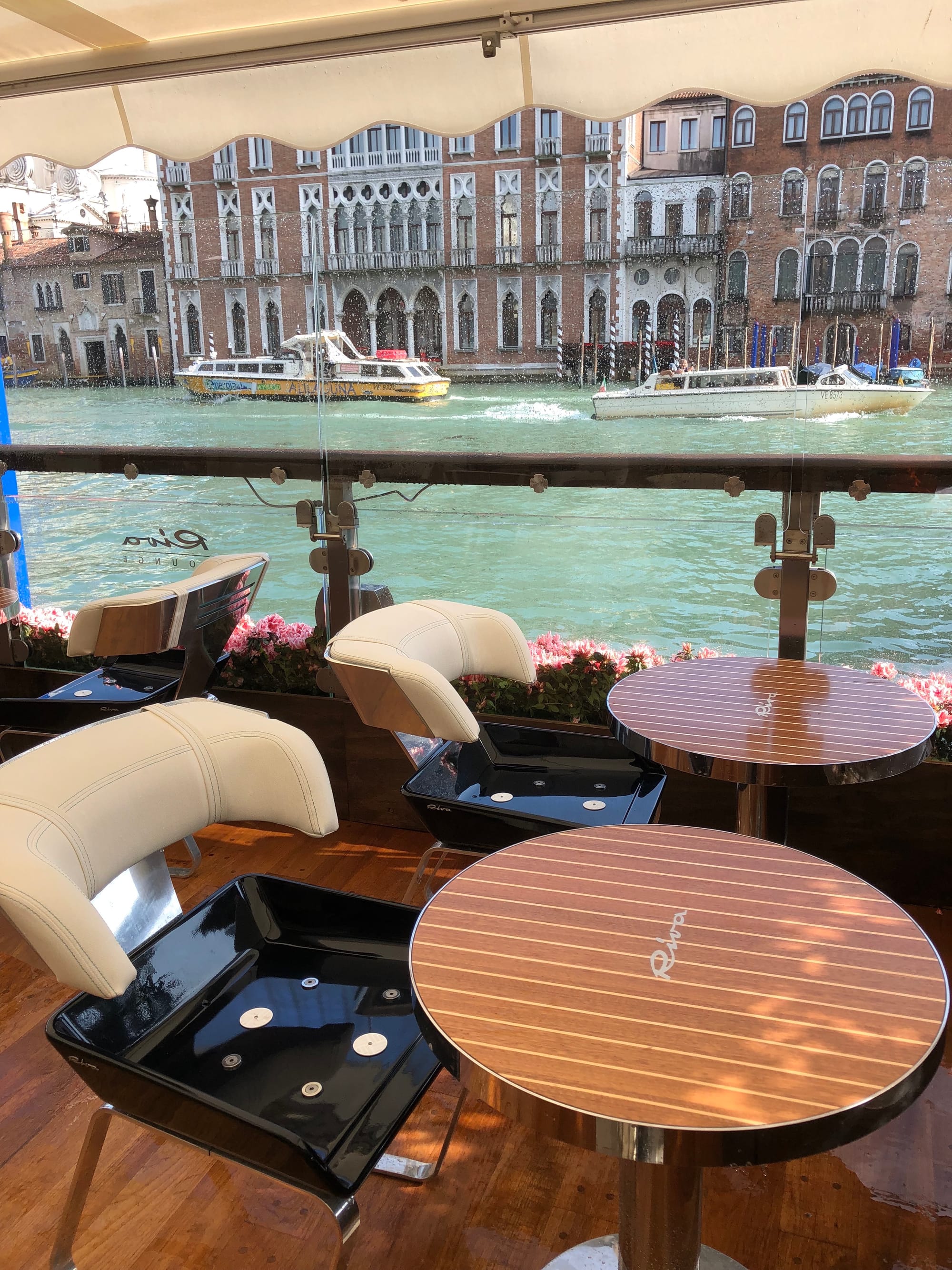 Downpour. Cool chairs in the famous Gritti Palace (such a guest book!)