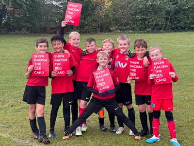 SHOW RACISM THE RED CARD