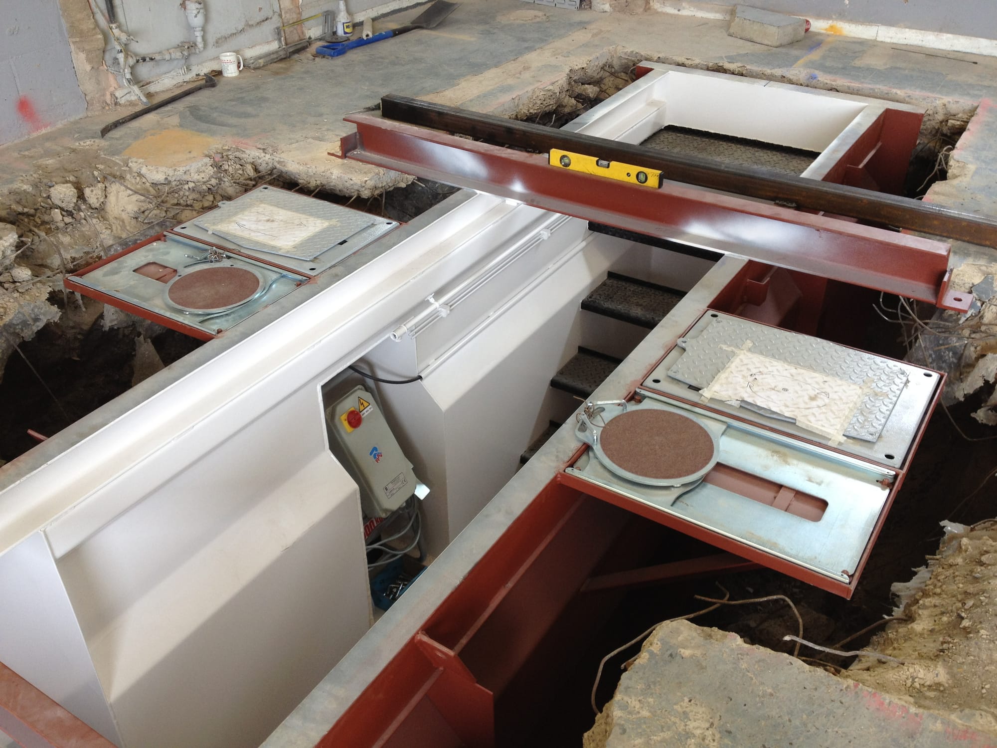 Customer ordered recess for wheelplay detector cabinet, plus pre-fabricted steel recesses for wheelplay detectors and turning plates.