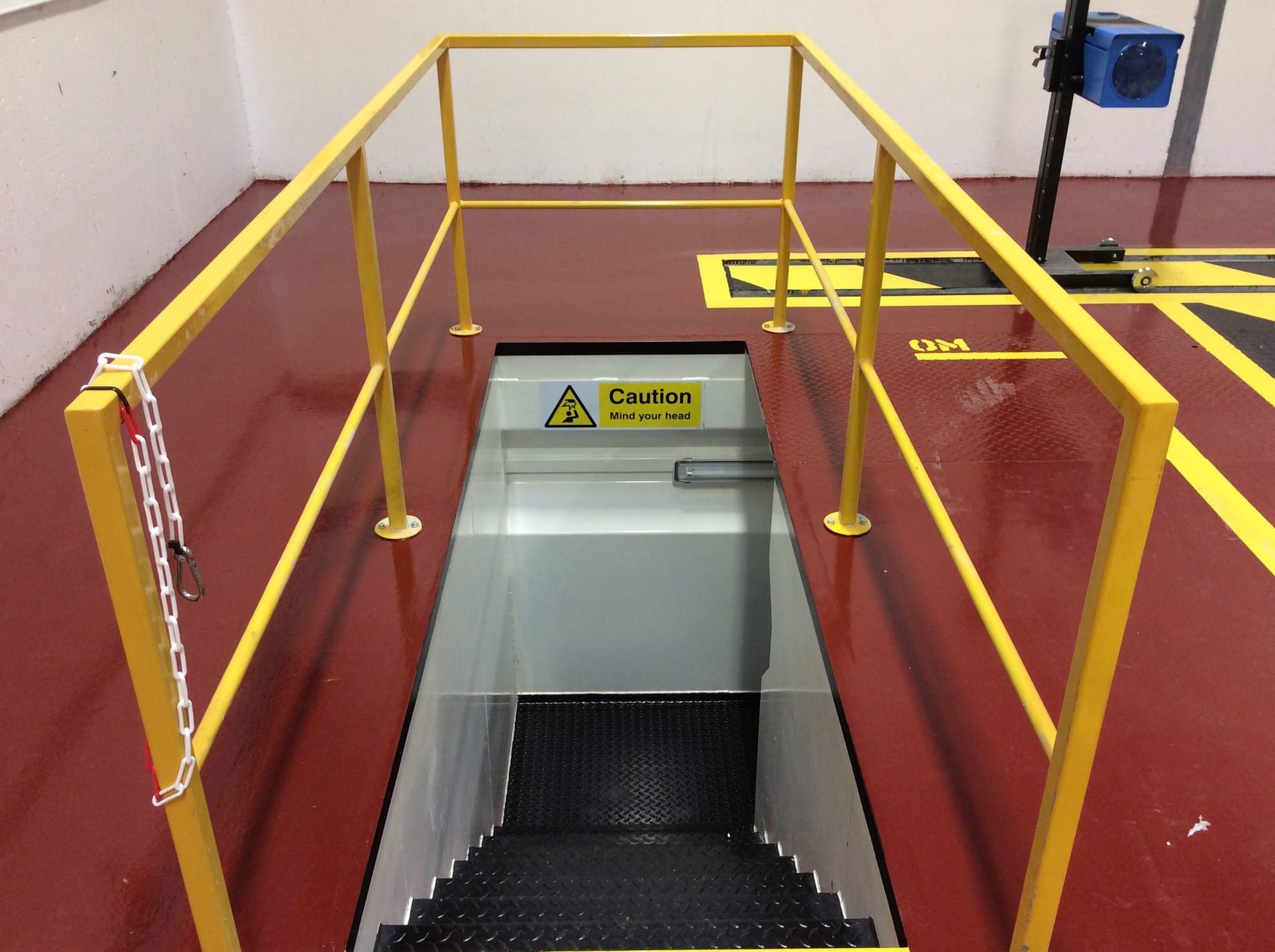 Walk-in access steps through tunnel to pit.