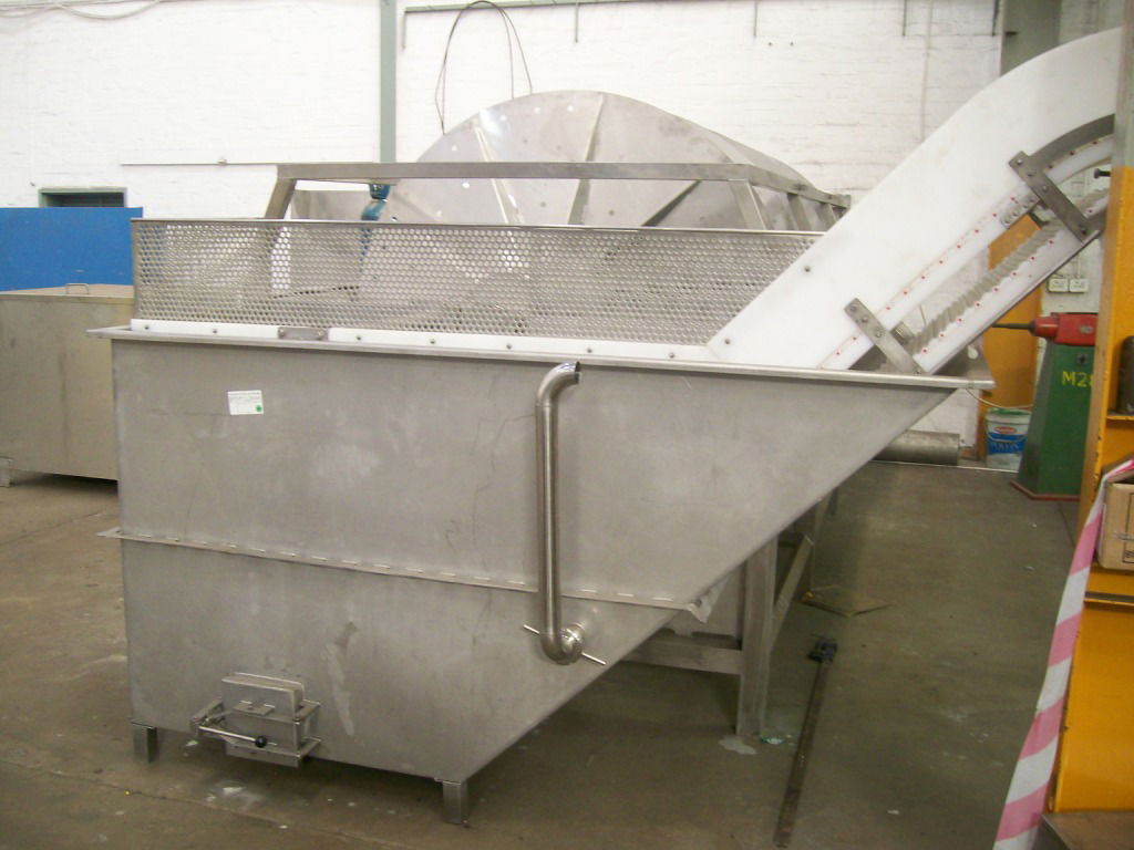 Holding tank with elevator conveyor