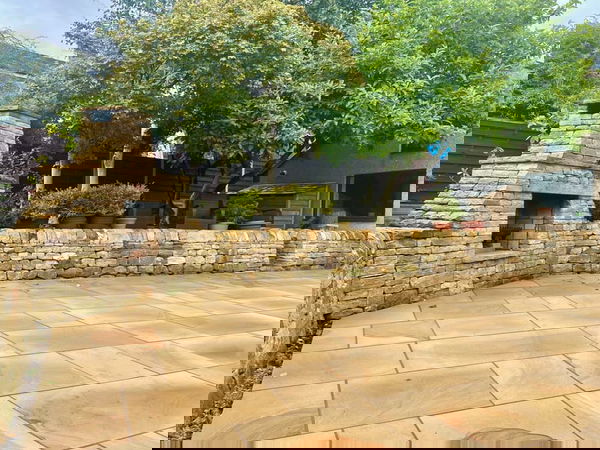 Garden makeover. Fireplace, seating area and small retaining walls
