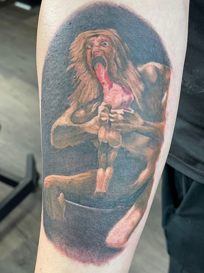 Saturn devouring his children tattoo