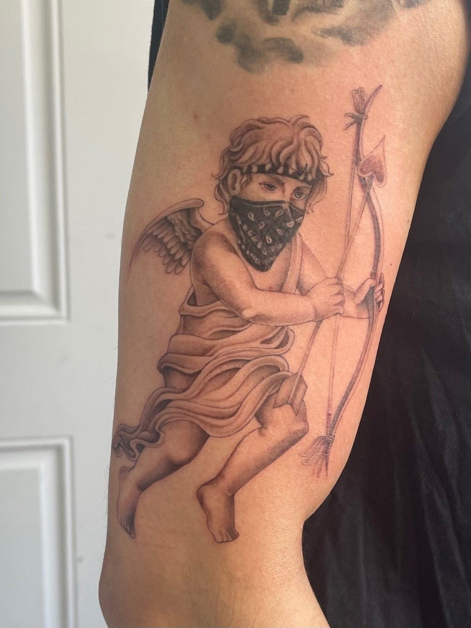 gangster cupid angel tattoo