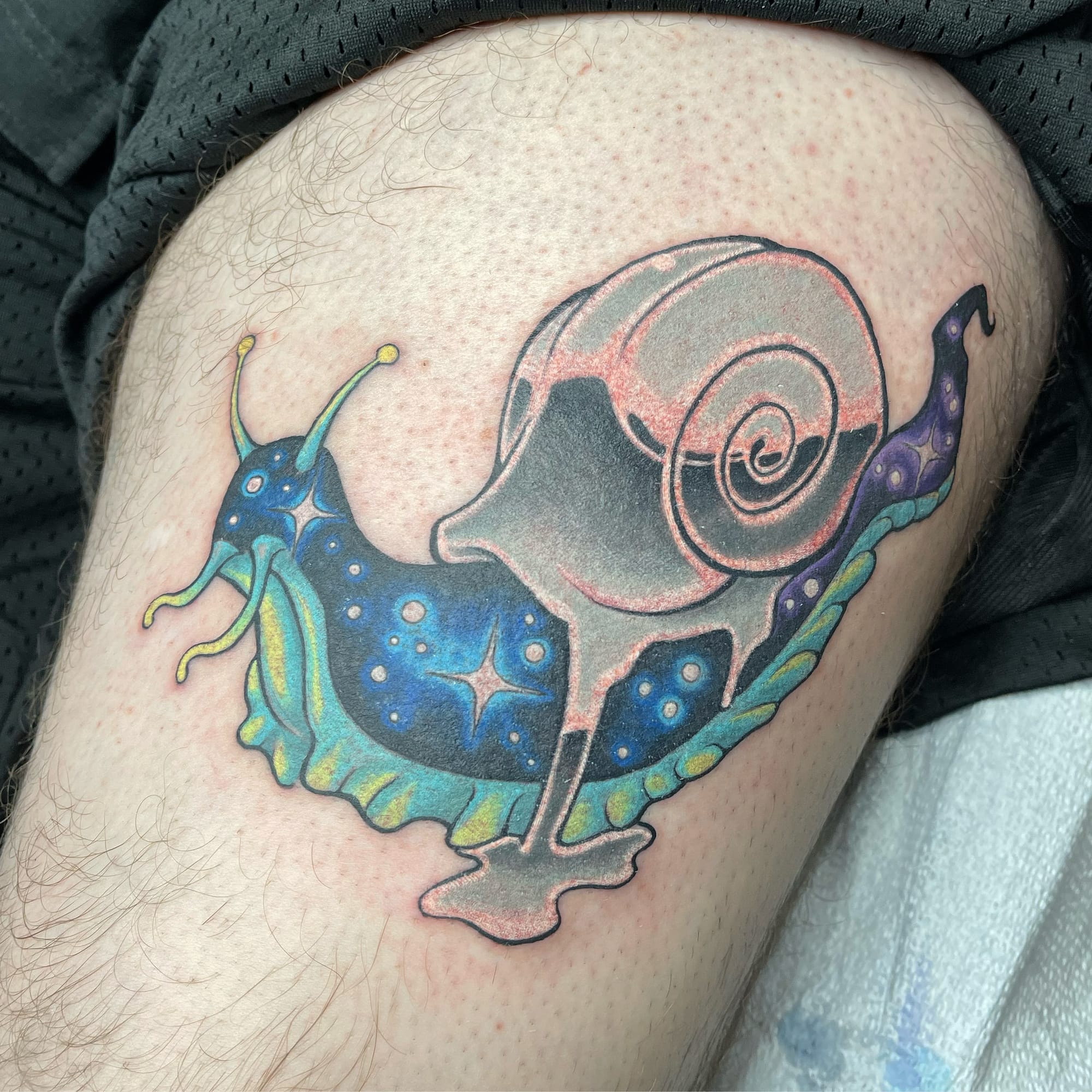 trippy snail tattoo