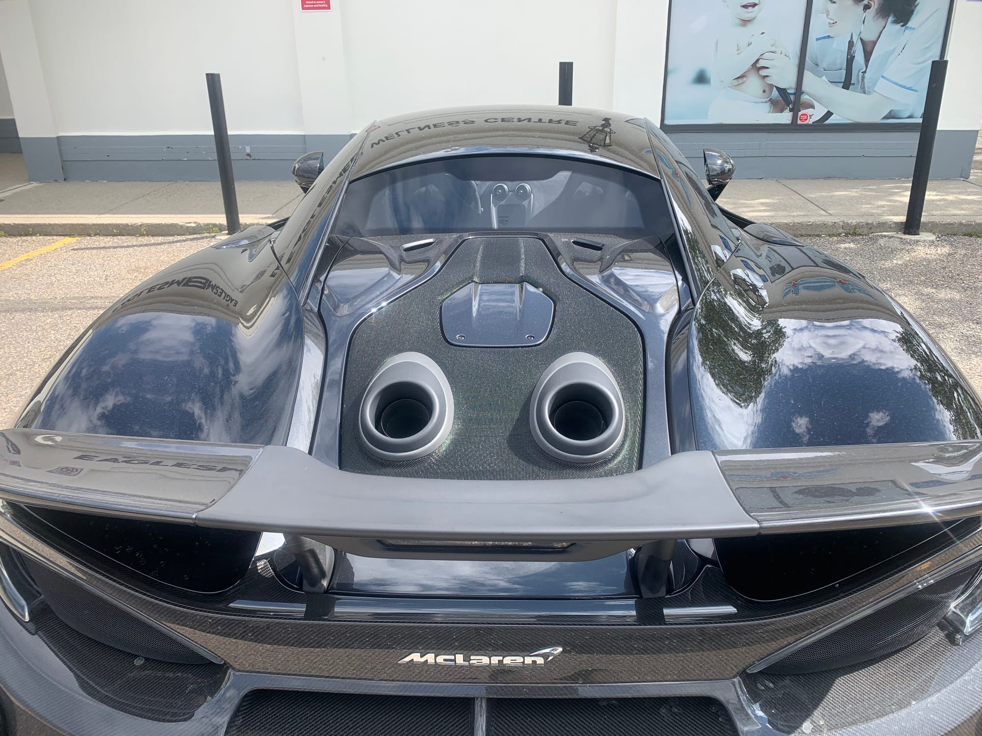 Minor hail damage on this McLaren