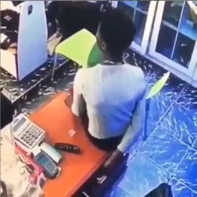 Lady Caught On CCTV Stealing From The Cashier's Drawer In A Fashion Store
