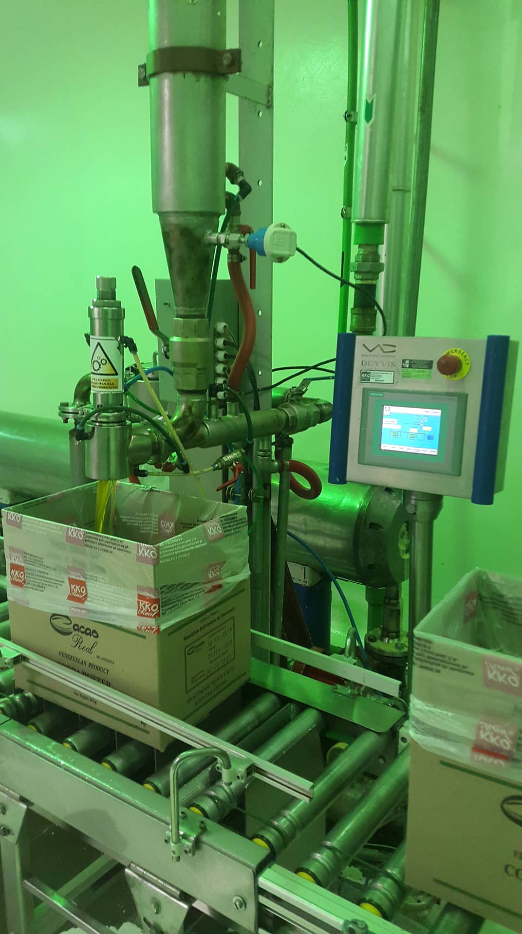 Área de Manteca: Panel de control y boquilla llenadora