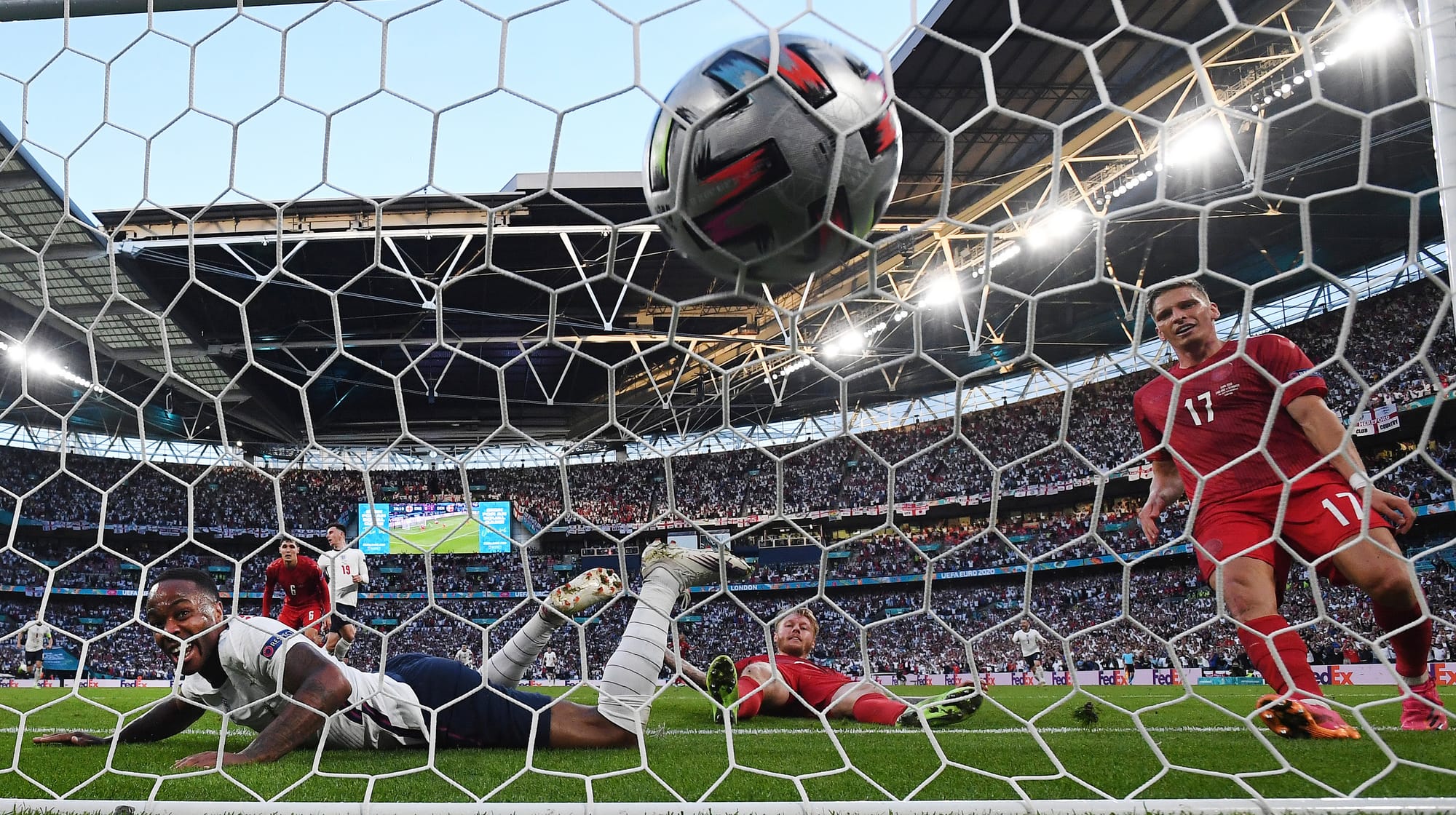 England Raheem Sterling watches England tie the score against Denmark. Euros 2020.