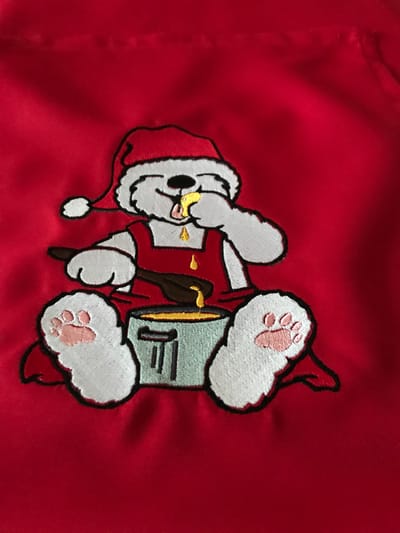 Red apron with christmas hat