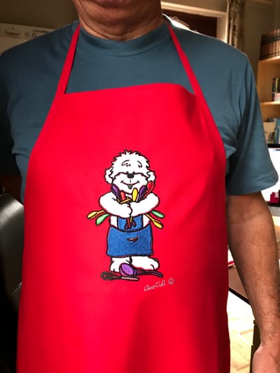 Apron with wooden spoons