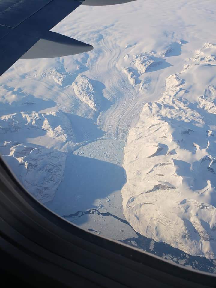 Flying over Greenland in March, look at the melting