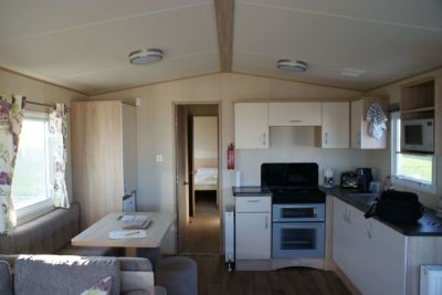 Kitchen Area And Dining Room