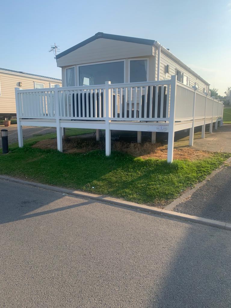 Front View Of Caravan And Decking Area