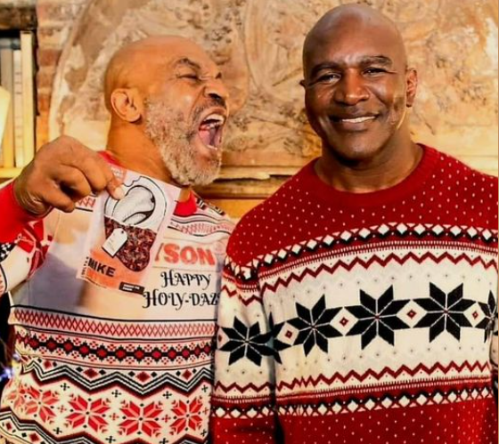 Mike Tyson and Evander Holyfield:  “Holy Ears” !
