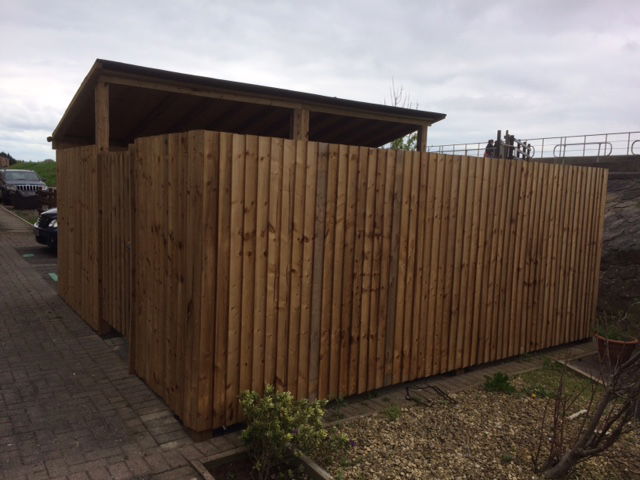 Feather edge bike shed and dustbin compound