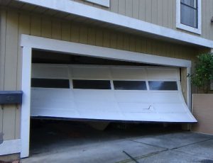 6 Signs your garage door needs repairs or maintenance.