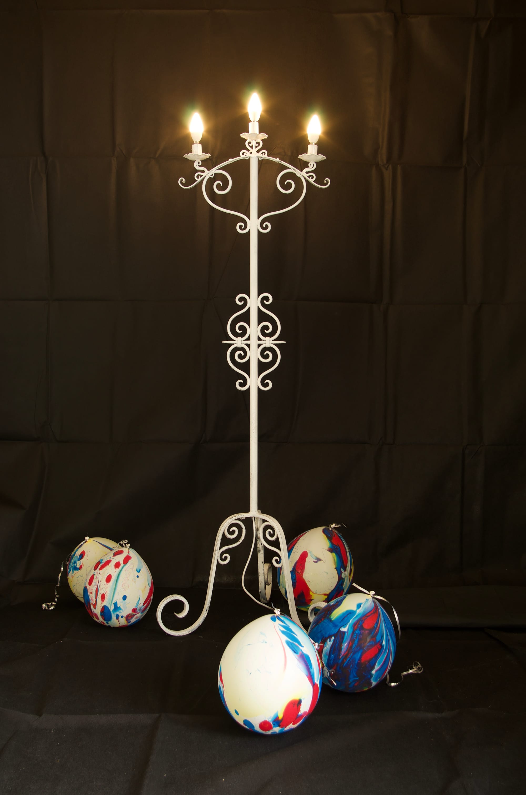 Antique heavy wrought iron scrolled candle floor standing lamp.