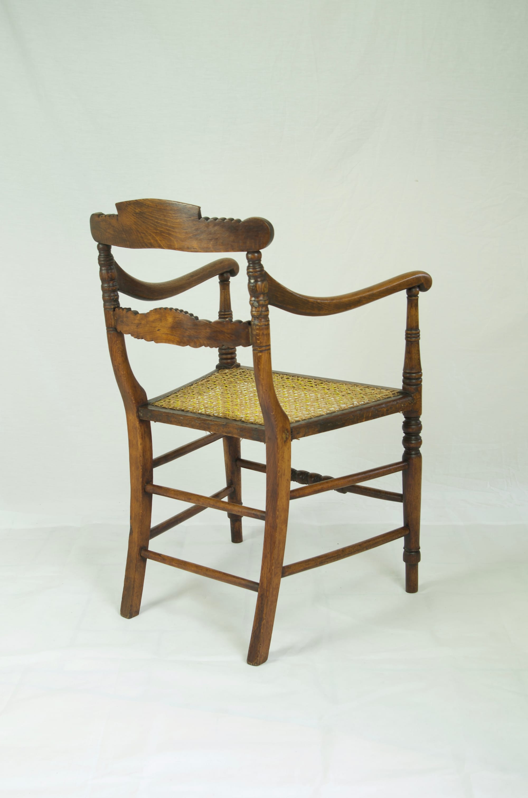 Anglo Indian Arm Chair in British Colonial Style.