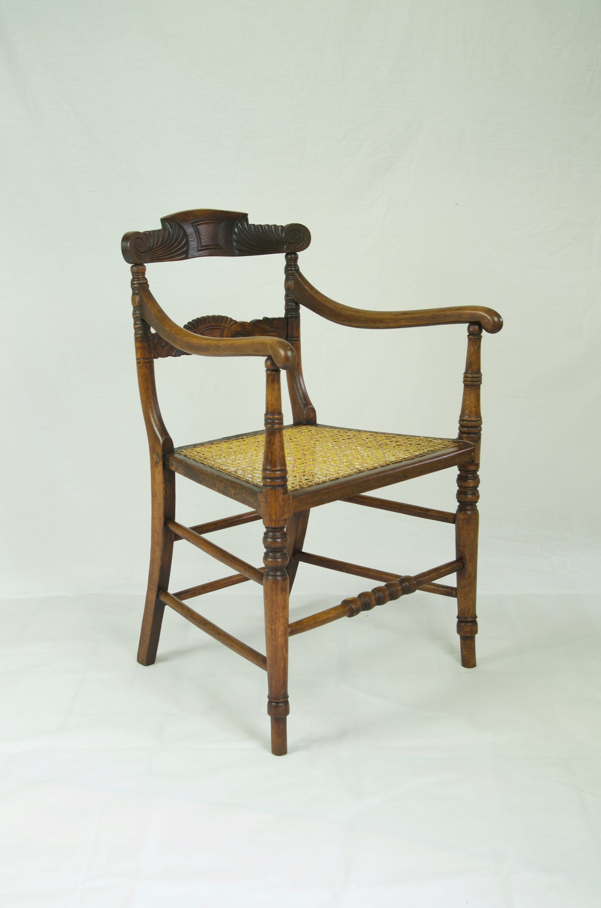 Anglo Indian Arm Chair in British Colonial Style.