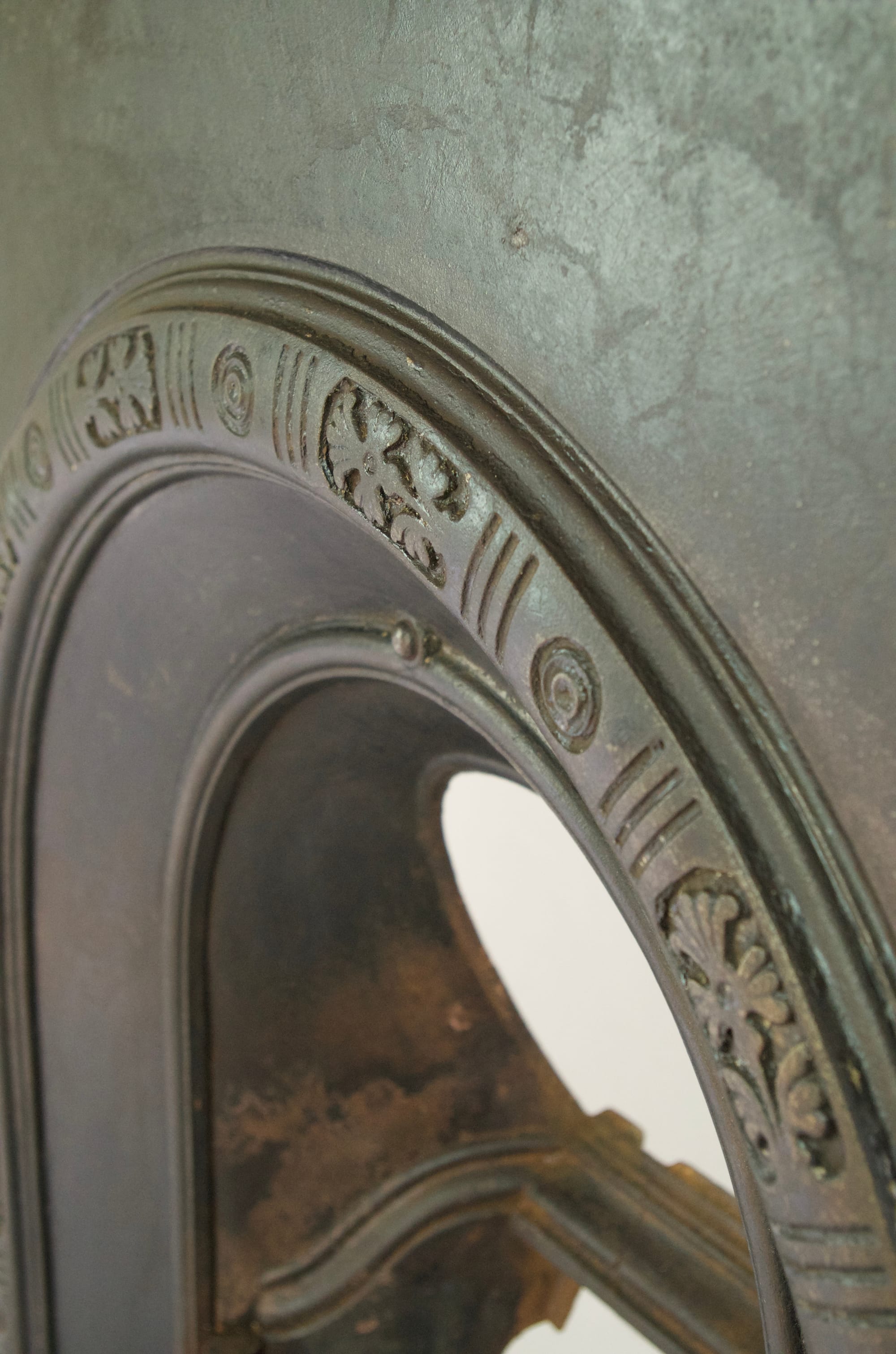 A Vintage reclaimed, early Victorian cast iron fire insert