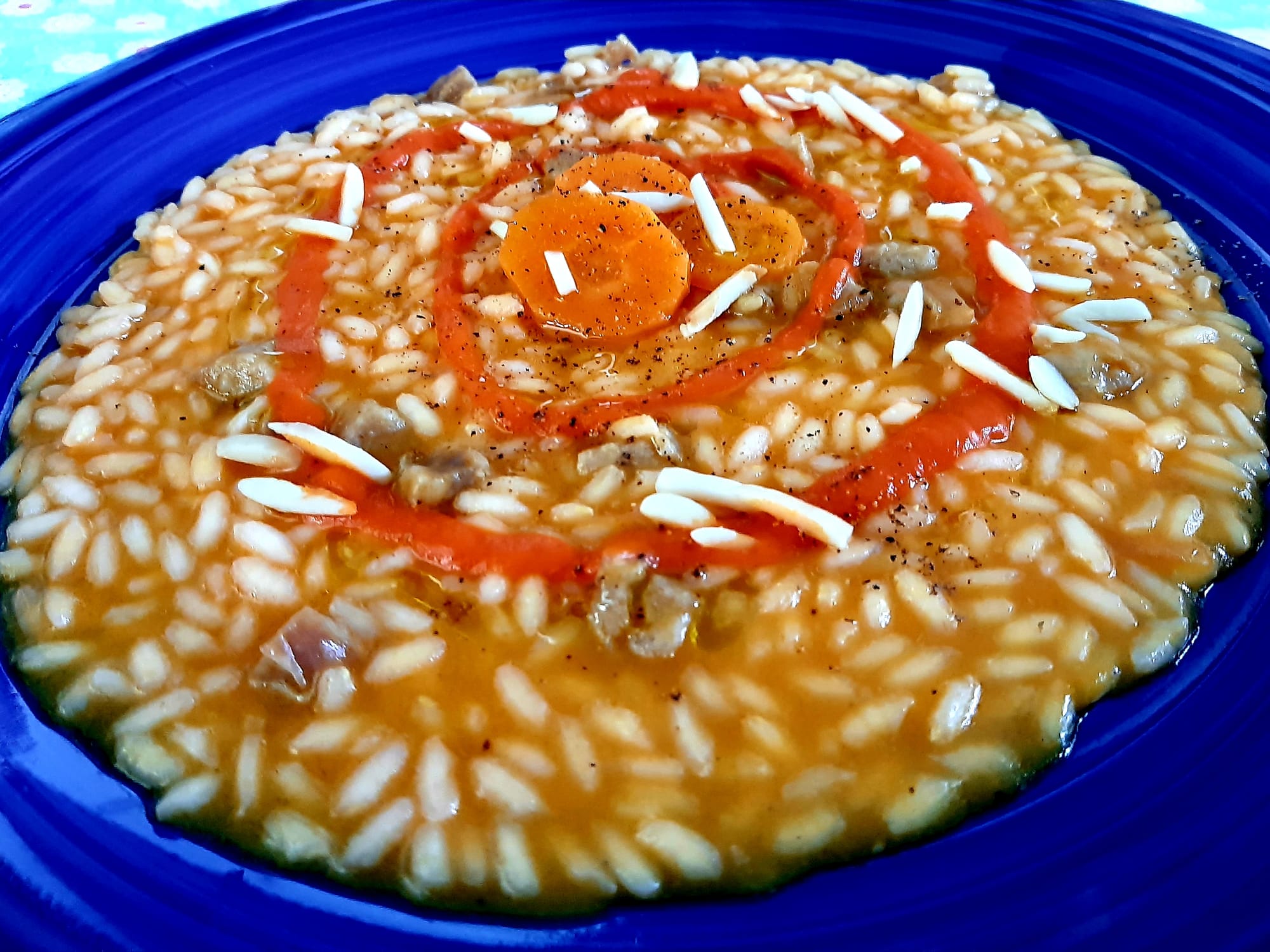 RISOTTO ALLE CAROTE E LAMELLE DI MANDORLE