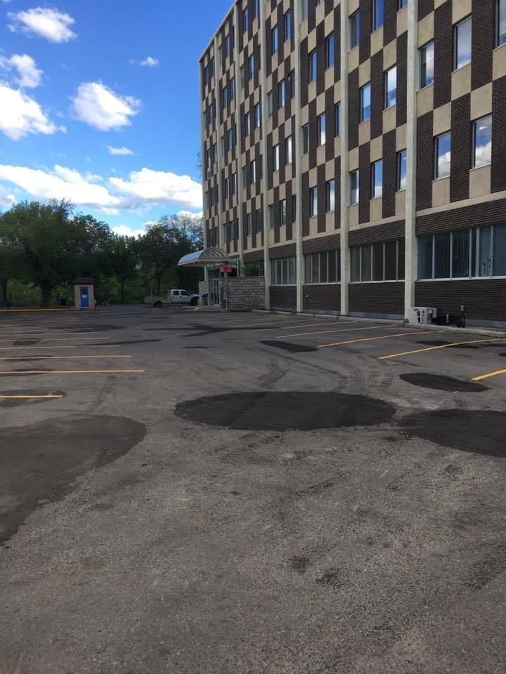 Parkinglot asphalt Patching, paving, slurry seal, crack seal, sweeping & line painting.