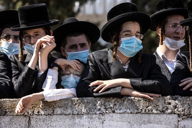 Violence and slurs from some of Israel's ultra-Orthodox Jews in battle over coronavirus lockdowns