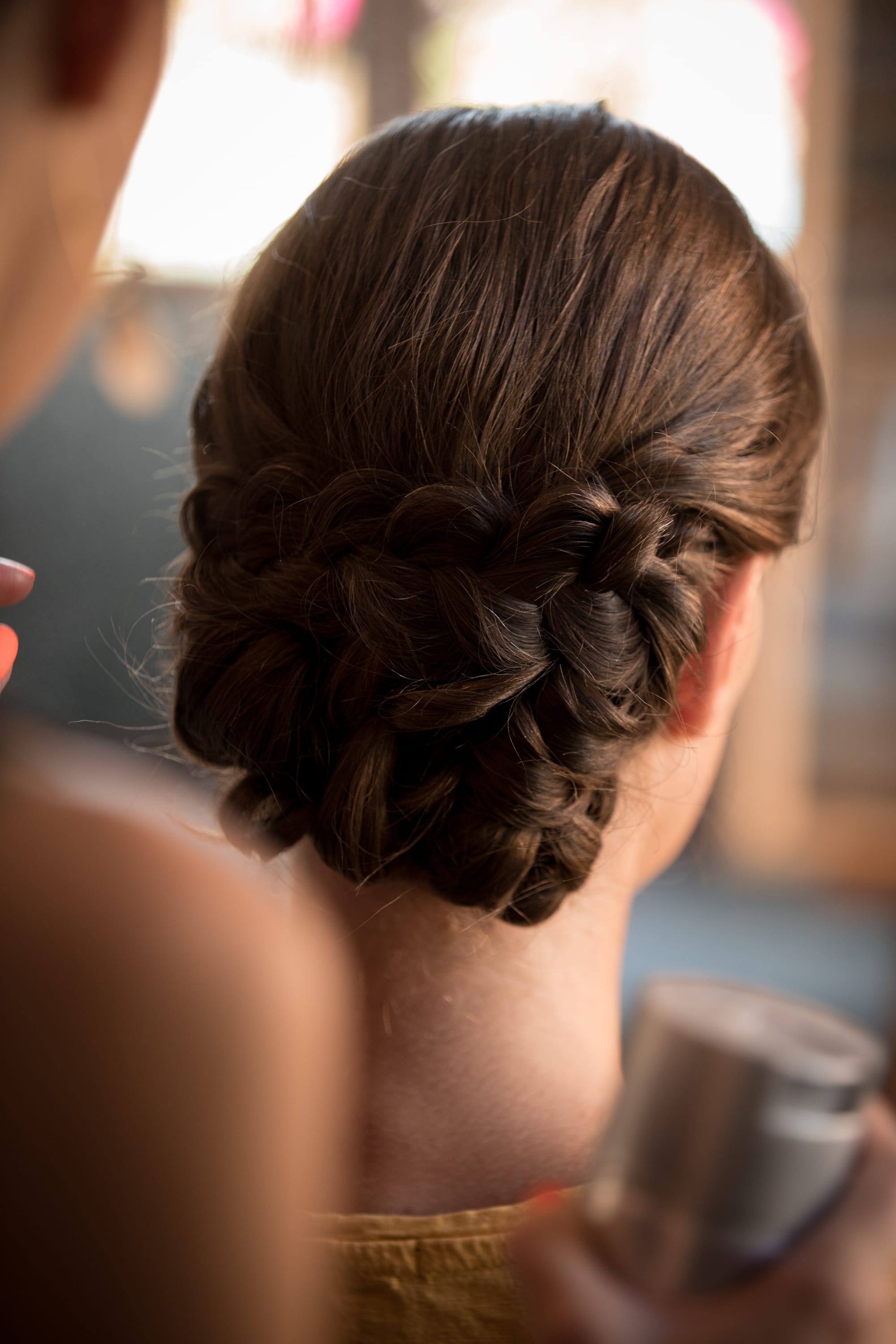 Chignon bas tressé coiffure marié