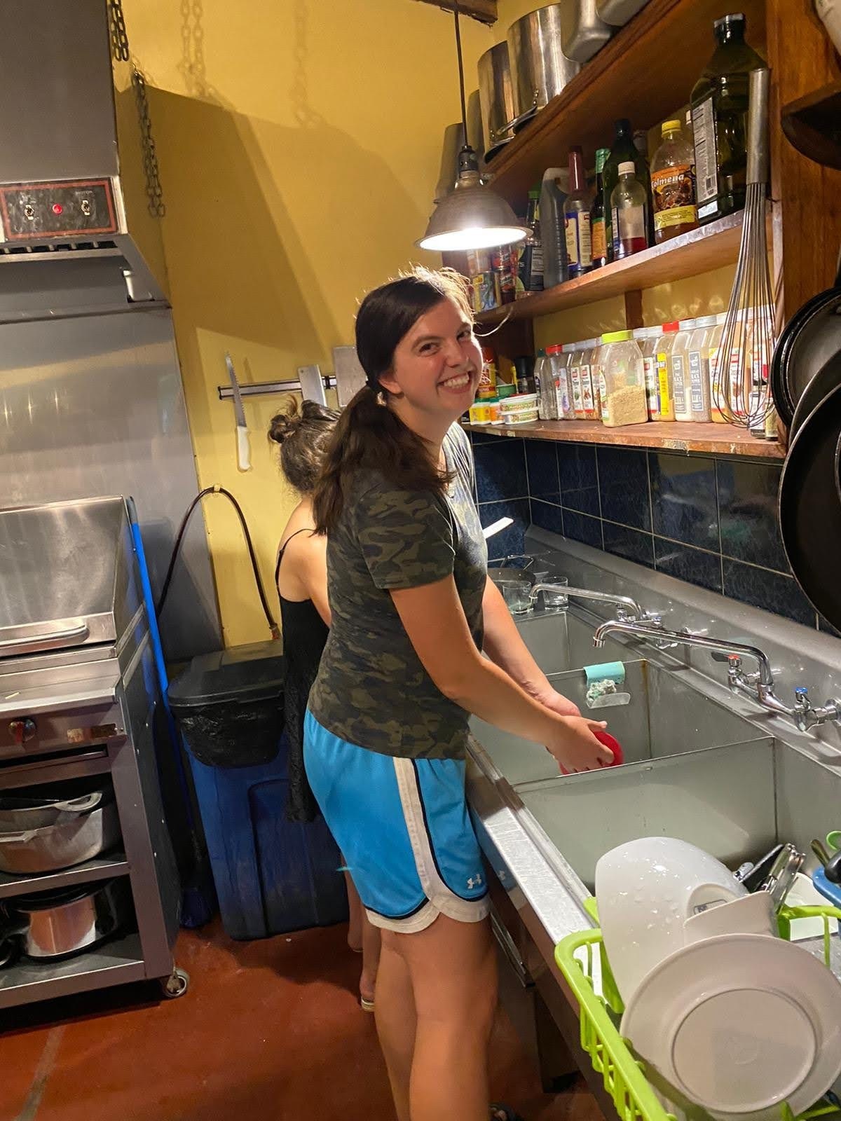 Washing dishes after making tortillas