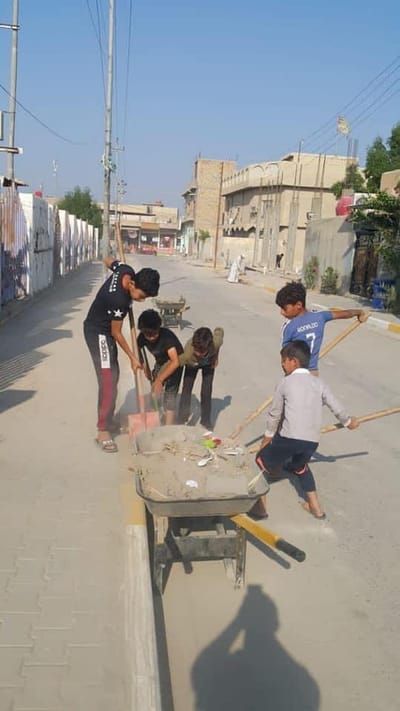 تحت شعار " نظف باب بيتك" ابطال وبراعم الحي يشاركون الحملة