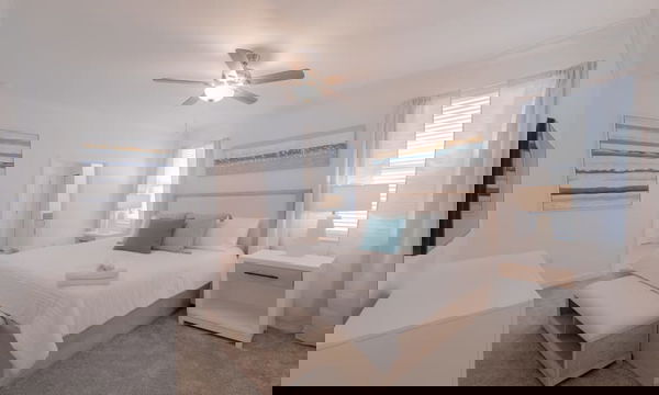 Bright and Calming King Bedroom in Storey Lake Resort in Kissimmee, Florida